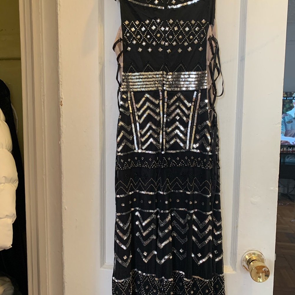 Lace upside gown black silver from Bebe. NWT